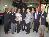 From left: Rodney Brutton, NCC Director of Workforce Development, Richard Rohrman, CEO of NCC, Regina Barboza of Newark Alliance, Rich Hyland of Sansone Auto, Tynika Moses of K & G Auto Service Center, Paul Peters of Ford Motor Company, Heather Allen of the New Jersey Transportation, Logistics, and Distribution Talent Network, Bill Atkinson of Ford Motor Company, Travis Walker of Sansone Auto, and Richard Liebler of Sansone Auto.