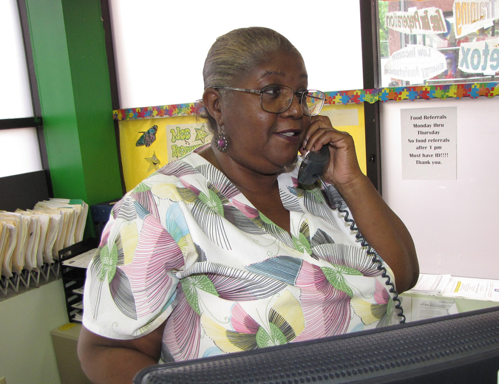 Denise Swiney, a Certified Nursing Assistant at New Community Extended Care Facility, volunteers at the NCC Family Resource Success Center where she mans the phone, helps clients fill out forms and assists wherever she is needed.