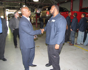 Newark Mayor Ras Baraka visited three New Community programs, including the Workforce Development Center’s Automotive Technician Employment and Training Program at 210 West Bigelow St. Trainee Dejon Thompson, right, shakes hands with Baraka.
