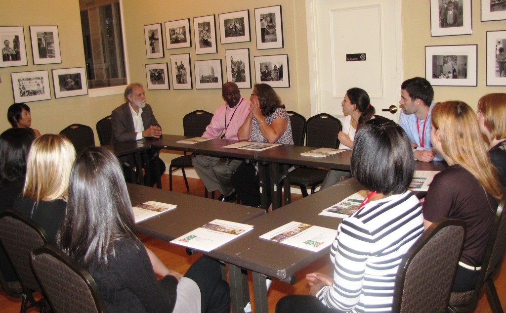 Richard Cammarieri, director of special projects at New Community, provided an overview of the history of New Community to a group of psychology interns and staff from Rutgers University Behavioral Health Care. Dr. Paula Iudica-Costa, seated center, assistant director of the psychology internship training in Newark, brings her interns to NCC each year.