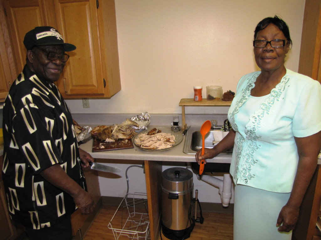 George Wedderburn, left, and his wife, Rosalee, helped to prepare a Thanksgiving meal for the residents of Orange Senior.
