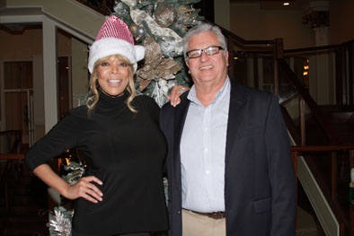Television celebrity Wendy Williams, left, with New Community CEO Richard Rohrman, right.