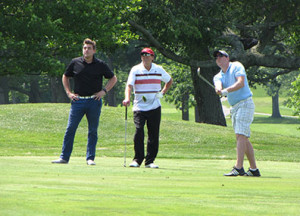 Robert Shawah, center, one of this year’s golf outing  co-chairs, during the 2015 golf fundraiser.