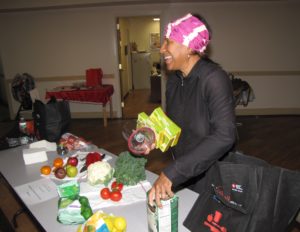 Delilah Winder, who goes by Chef Delilah, prepared a healthy and quick dessert at New Community Commons Senior.