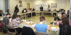 CEO Richard Rohrman, standing center at front of room, addresses Financial Opportunity Center staff representing agencies across New Jersey, New York and Pennsylvania.