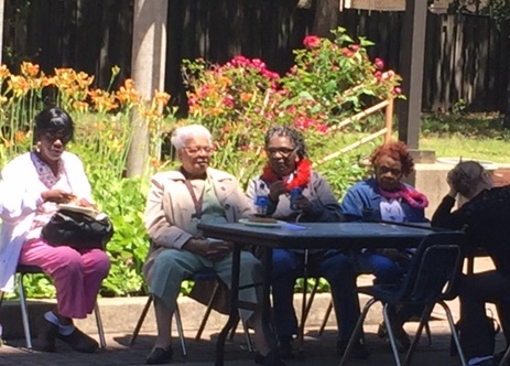 Residents of Douglas Homes enjoy sunny weather on the back patio and garden. Photos courtesy of Donnette Burrowes-Williams.