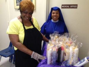 Each attendee received an appreciation gift presented by Care Coordinator Sister Mary Prisca, right.