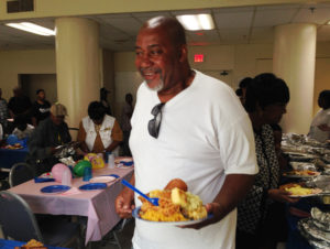 Residents enjoyed the luncheon, which featured fried chicken, cornbread, macaroni spaghetti, and more, and also participated in raffle drawings.