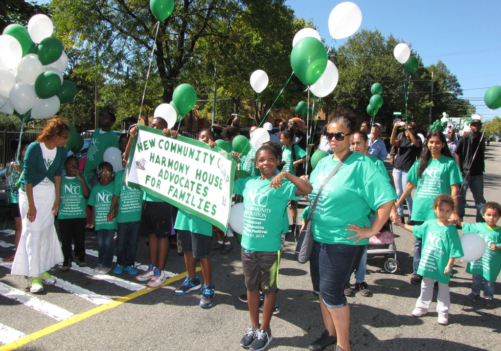 File photo of 2015 parade marchers from Harmony House, a transitional housing facility for homeless families.