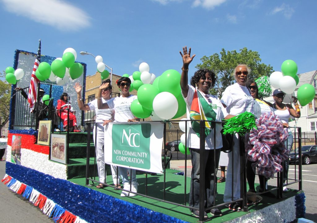 New Community’s departments of Property Management and Health and Social Services led the parade line-up by representing the first of NCC’s developments: housing.