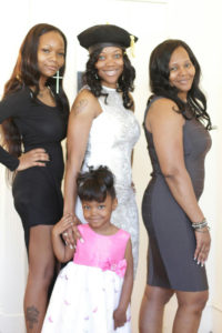 From left: Shannon Murray, sister; Tyana Murray, Deborah Walker, mother. Front center is Tahyae Fisher.