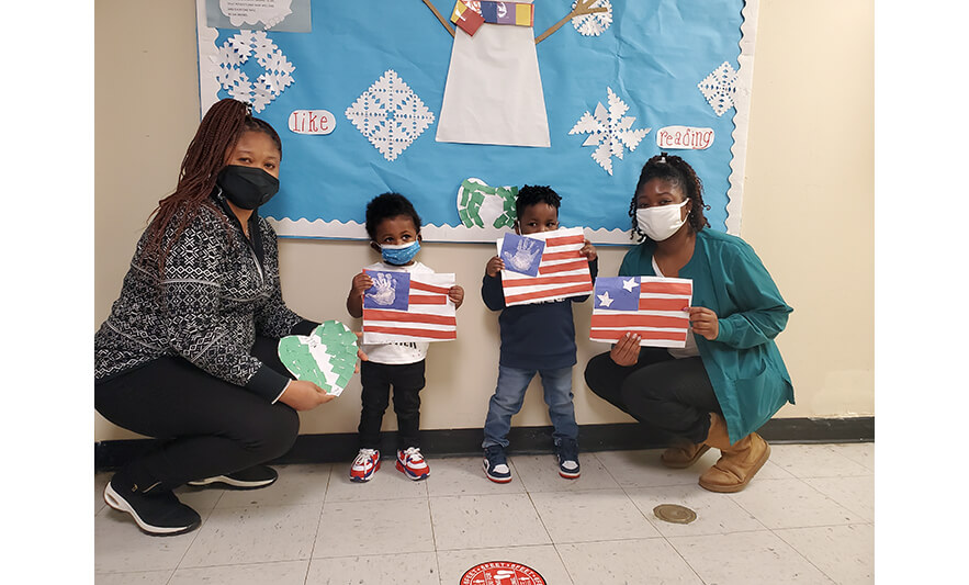 HHELC Black History Month 2021 Teachers and Kids with Made Flags for Web