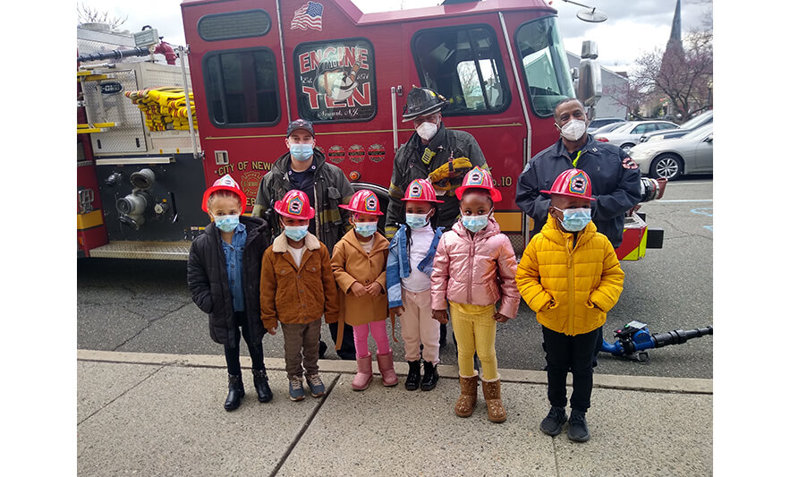 CHELC Fire Department Visit 4-16-2021 Group with Fire Hats for Web