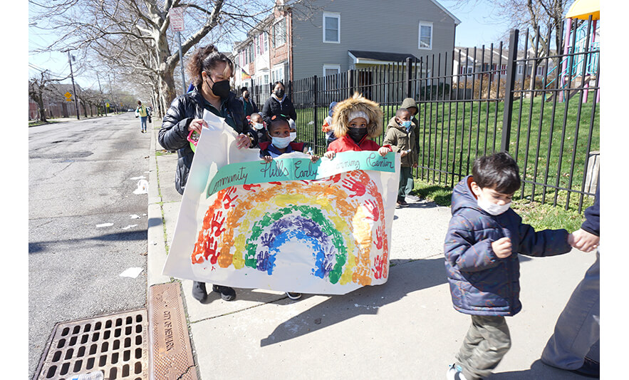 CHELC Week of the Young Child Parade 4-8-2022 Rainbow banner for web