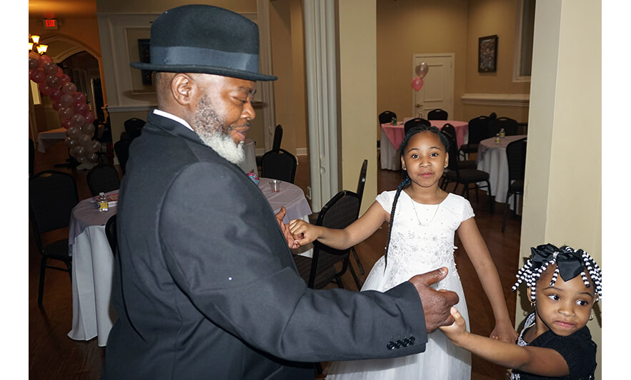 Father-Daughter Dance 4-30-2022 Dad in hat with two girls for web