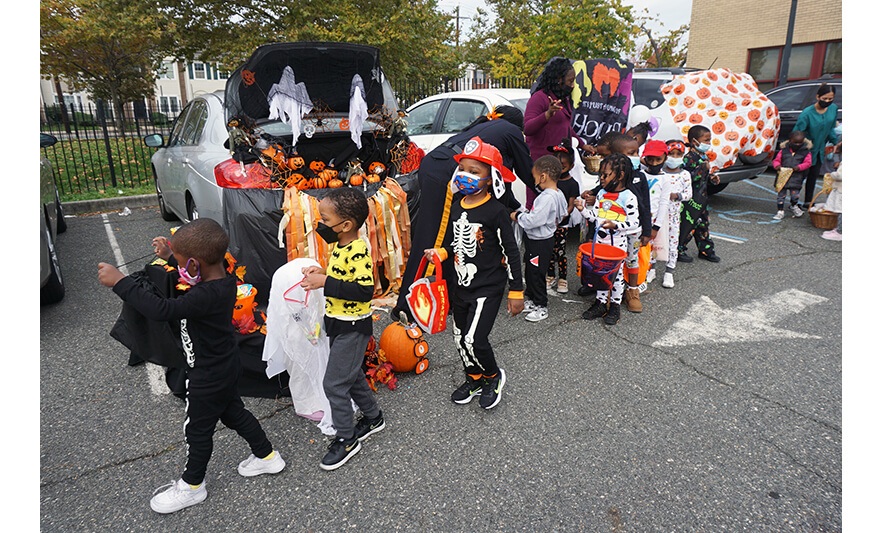 CHELC Trunk or Treat 10-31-2022 Line of children walking for web