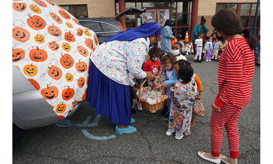 CHELC Trunk or Treat 10-31-2022 Sister Maurice handing out candy for web