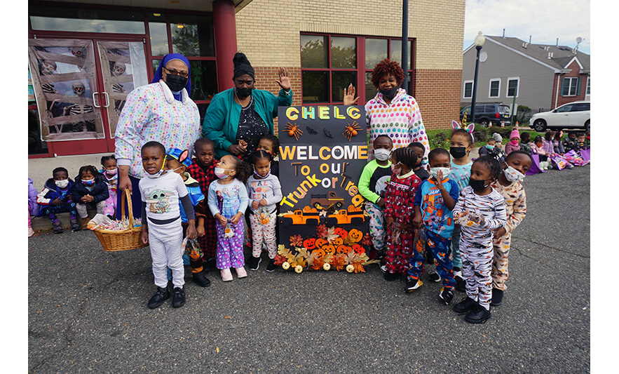 CHELC Trunk or Treat 10-31-2022 Sister Maurice with class at sign for web