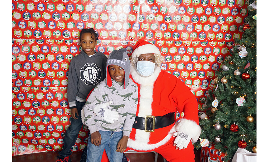 Breakfast with Santa 12-17-2022 Two kids with Santa for web