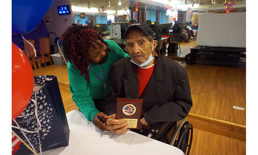 Extended Care Veterans Day 11-11-2022 Rice Robinson with plaque for web