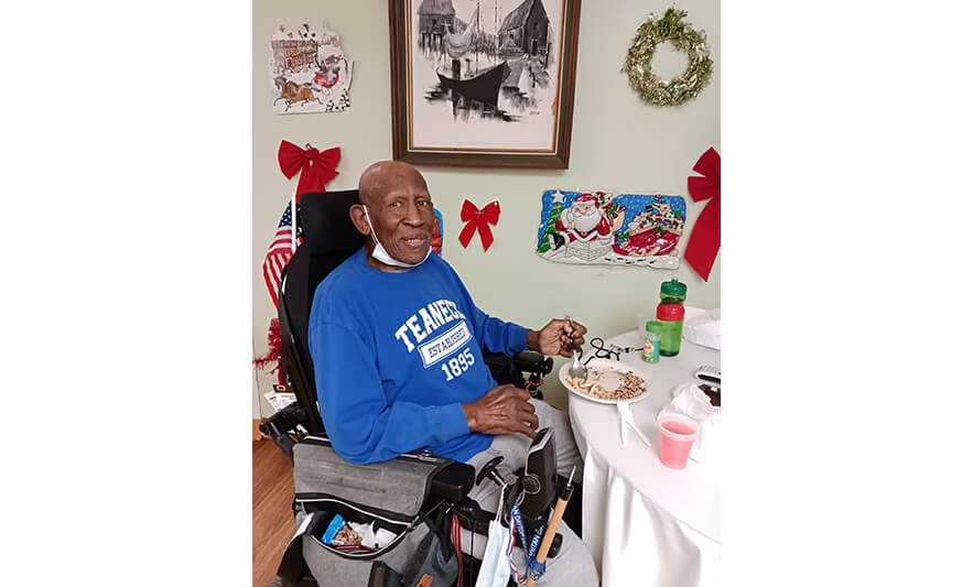 Extended Care Christmas 12-14-2022 Man in blue for web