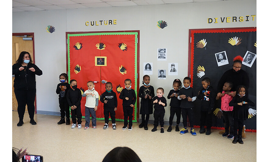 CHELC Black History Month Program 2-24-2023 Class pointing at themselves for web