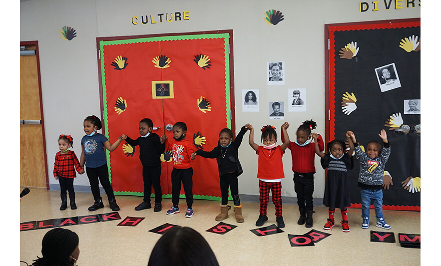 CHELC Black History Month Program 2-24-2023 Class with arms up for web