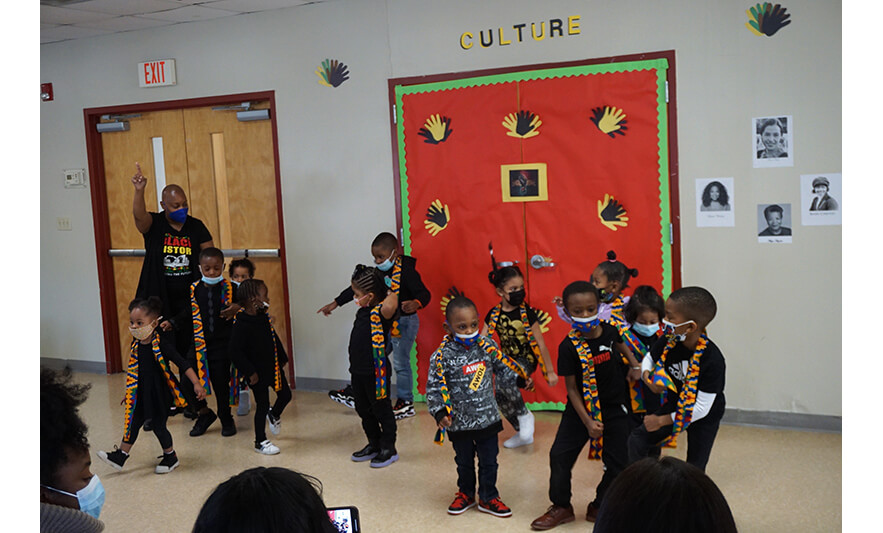 CHELC Black History Month Program 2-24-2023 Group in scarves dancing for web