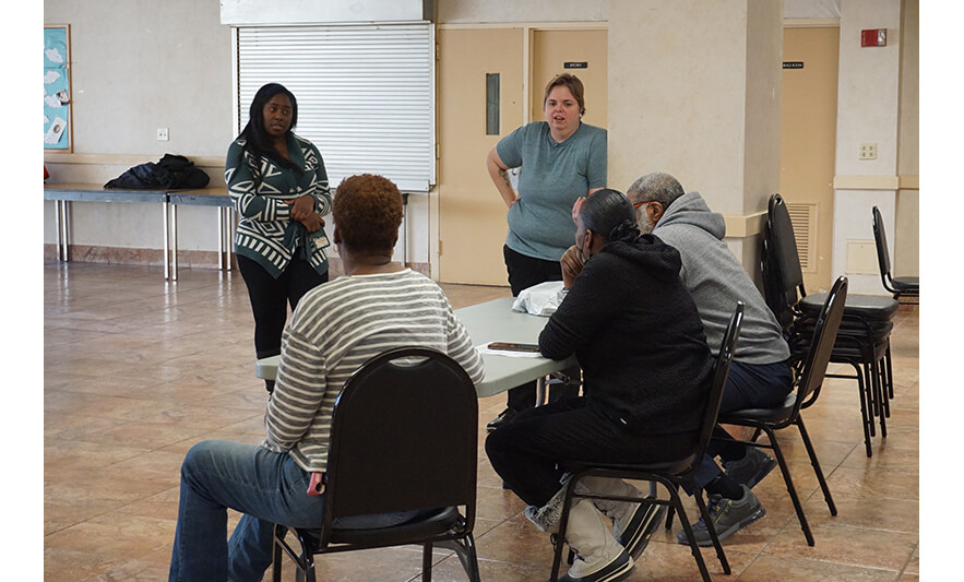 FSB Substance Abuse Workshop at Associates 2-3-2023 Sheneque Williams and Christina Ward talking to residents for web