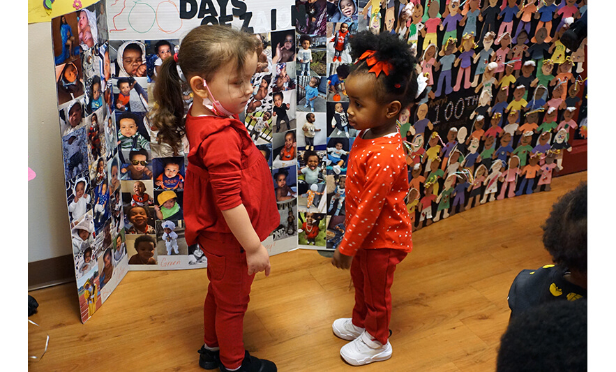Two little girls in red for web