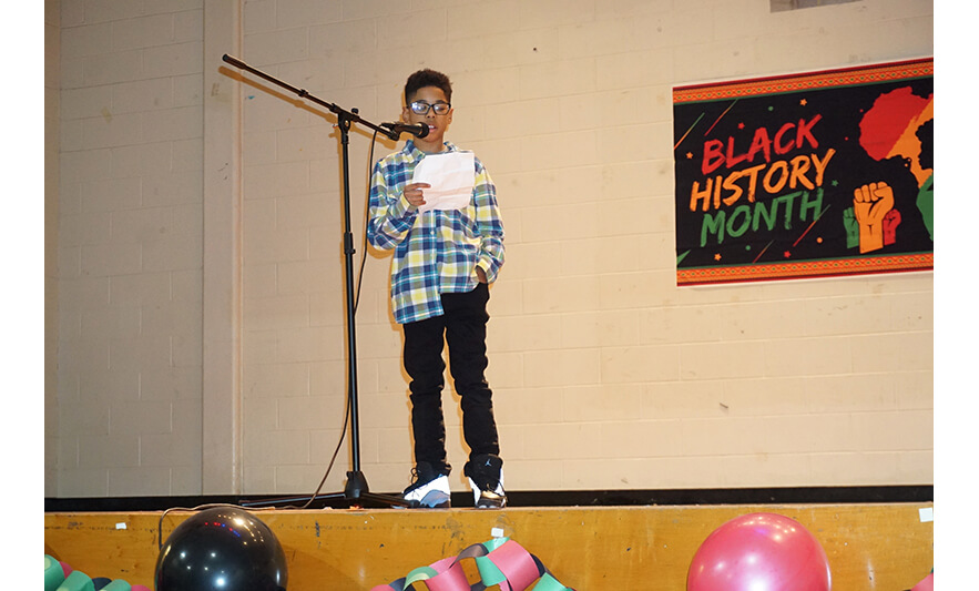 Youth Services Black History Month Program 2-24-2023 Boy in checkered shirt for web