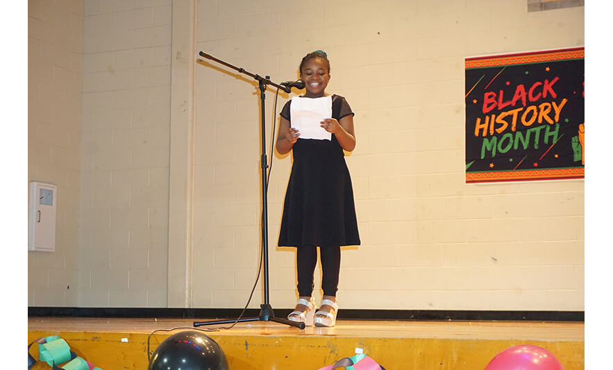 Youth Services Black History Month Program 2-24-2023 Girl presenting Ruby Bridges for web