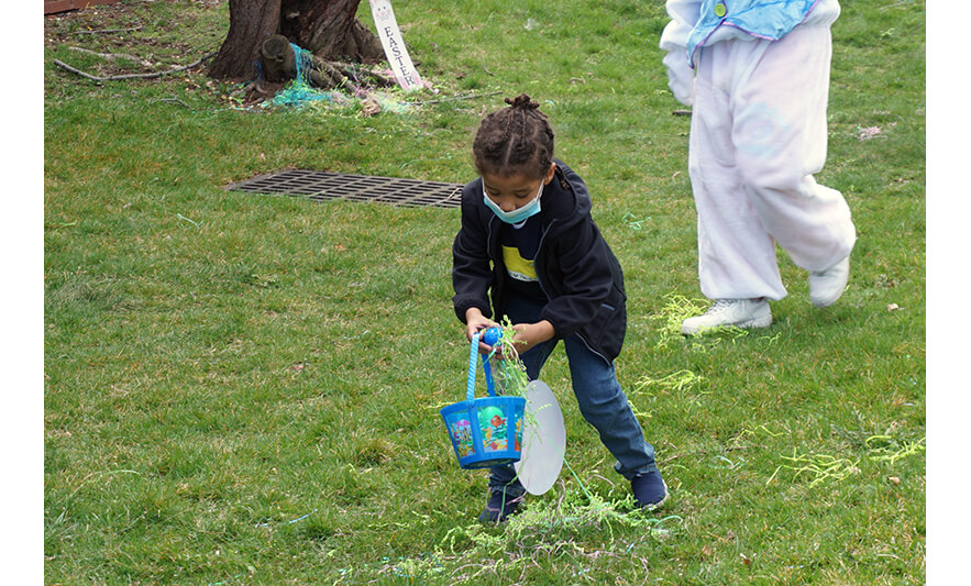 CHELC Easter and Family Fun Day 4-6-2023 Child getting blue egg for web