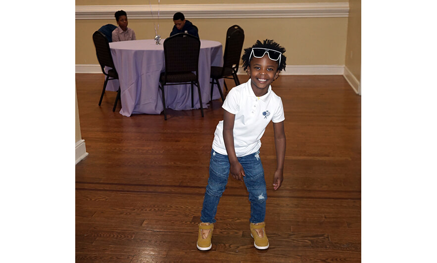 Youth Services Sneaker Ball Gala 6-10-2023 Boy in sunglasses for web