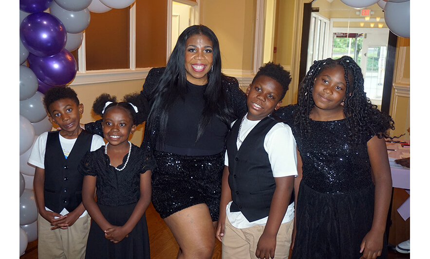 Youth Services Sneaker Ball Gala 6-10-2023 Family of 5 in black for web