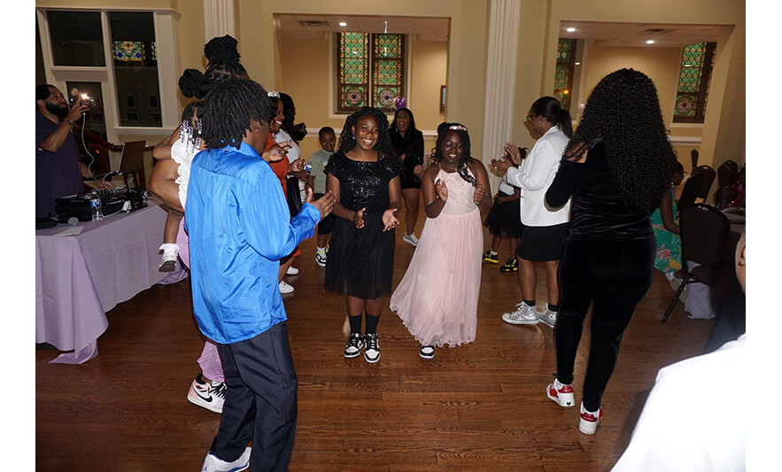 Youth Services Sneaker Ball Gala 6-10-2023 Girls clapping for web