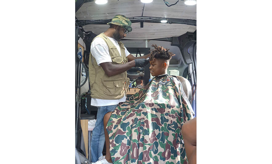 Harmony House Back to School 8-28-2023 Mobile barber at work for web