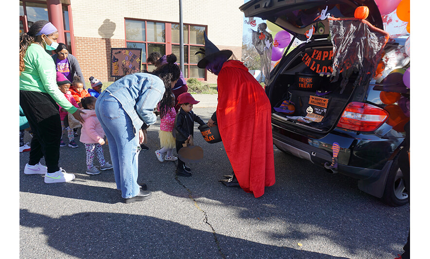CHELC Trunk or Treat 10-31-2023 Side view getting candy for web