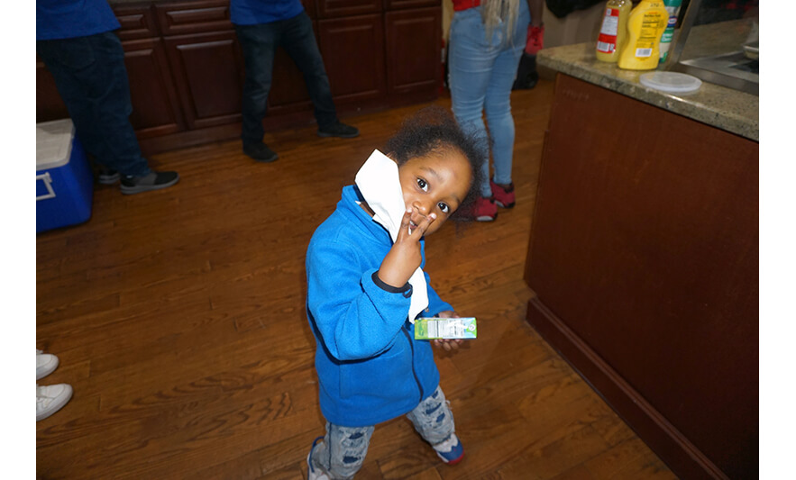 Withum Harmony House Thanksgiving 11-21-2023 Child with juice box for web