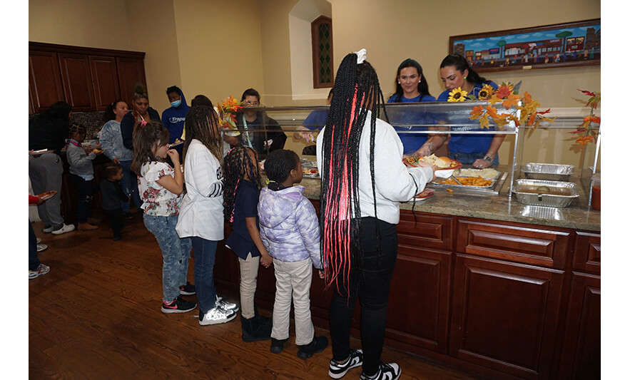 Withum Harmony House Thanksgiving 11-21-2023 Kids getting served for web
