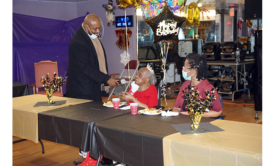 Extended Care 100th Birthday 12-13-2023 Councilman Dupre Kelly speaking with Edna Hill for web