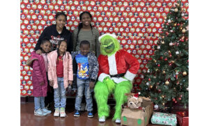 Read more about the article Families Enjoy Breakfast with the Grinch Hosted by New Community Youth Services