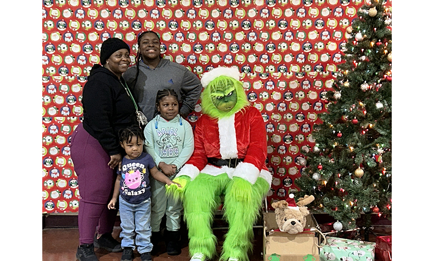 Youth Services Breakfast with the Grinch 12-16-2023 Four with Grinch for web