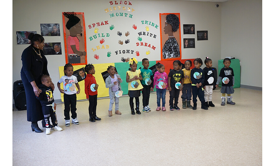 CHELC Black History Month 2-23-2024 Class with globes and hands for web