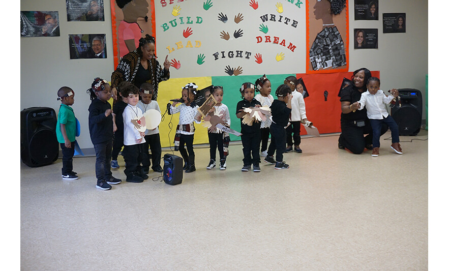 CHELC Black History Month 2-23-2024 Class with signs and microphone for web