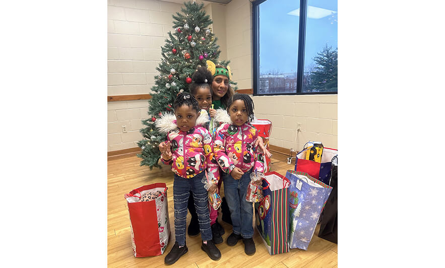 Harmony House Christmas Party 12-17-2023 Sally Milad with 3 girls for web