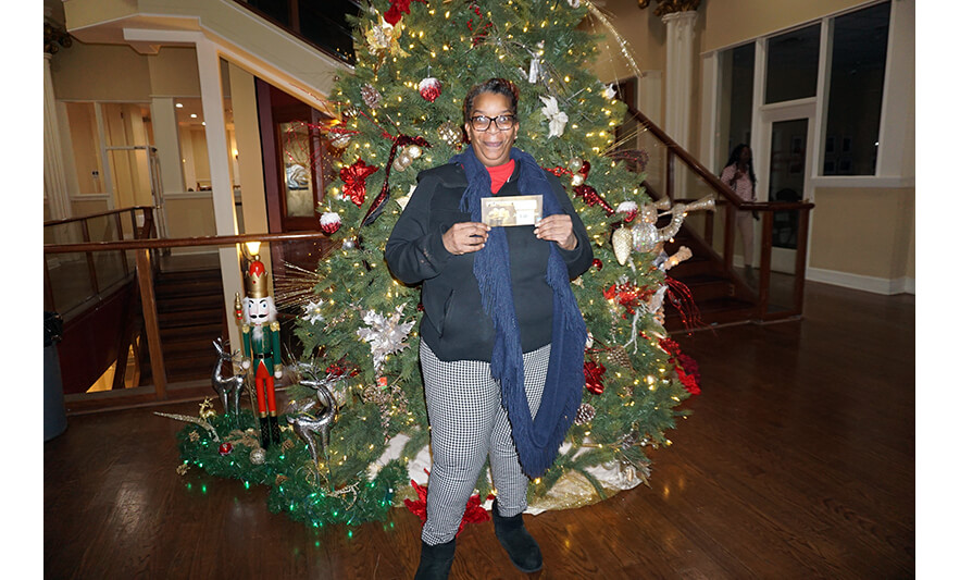 NCC Employee Holiday Party 12-14-2023 Kenya Cooper with gift card for web