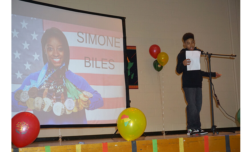 Youth Services Black History Month 3-1-2024 Reading about Simone Biles for web